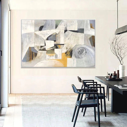Abstract art piece on a wall in a modern dining room