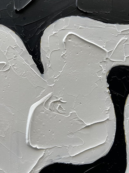 Close-up of a textured surface with black and white colors