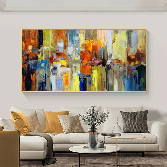Modern living room with a colorful abstract painting on the wall above a sofa.