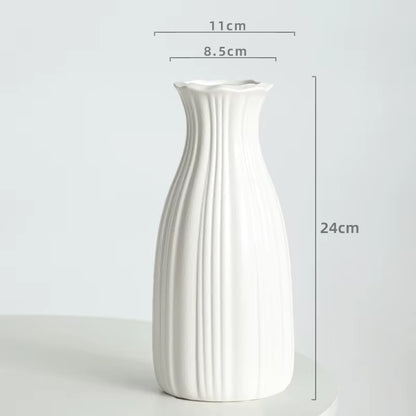 White ceramic vase with dimensions on a light gray background
