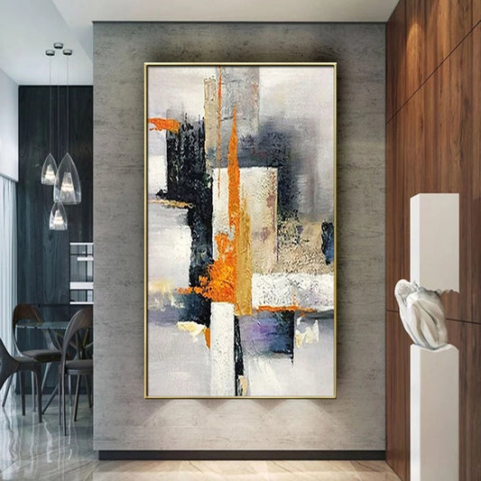 Abstract painting in a modern interior setting with wooden cabinets and a dining area.