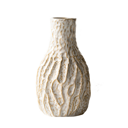 Textured ceramic vase on a white background