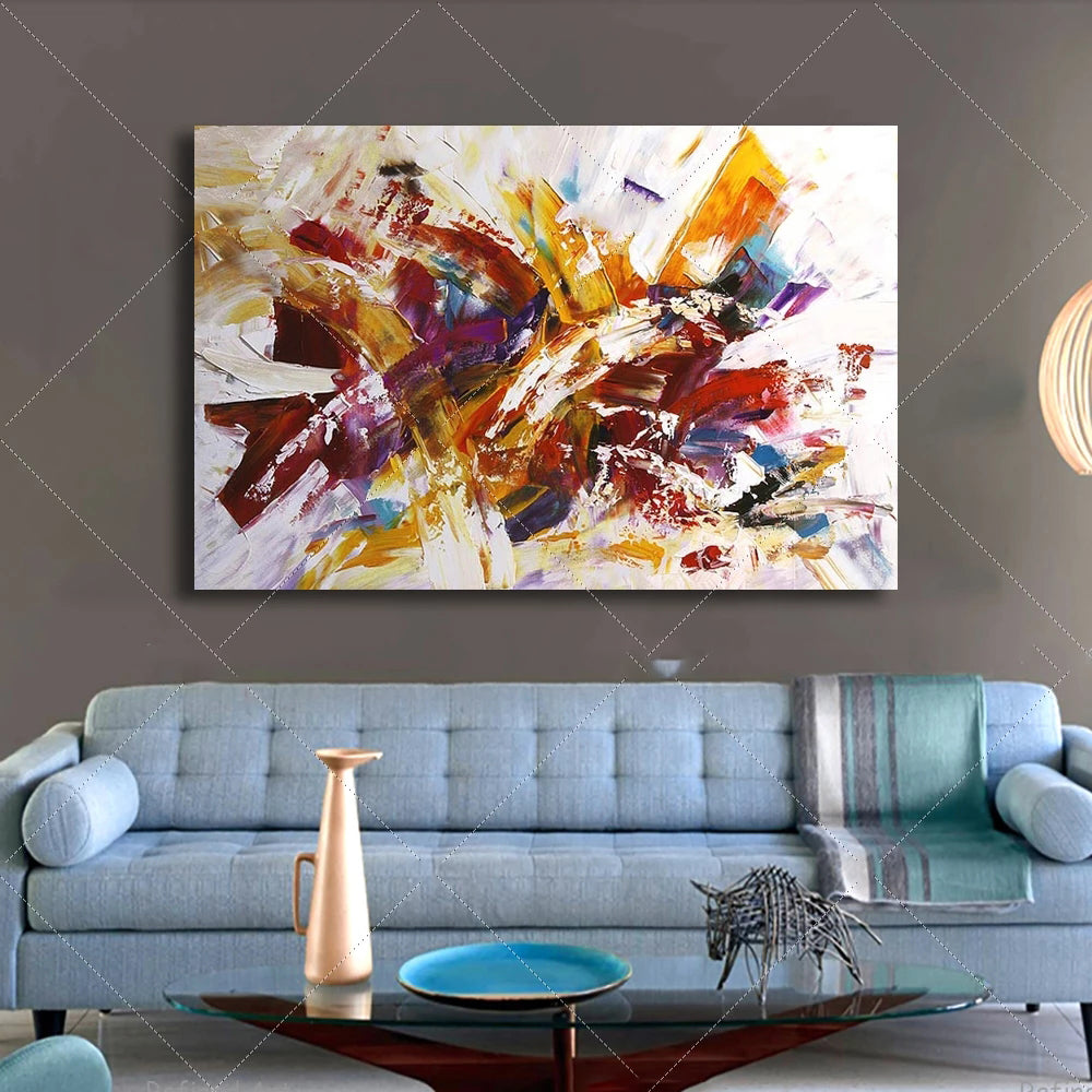 Abstract painting on a wall above a sofa in a living room