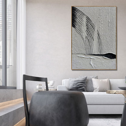 Abstract art piece on a wall in a modern living room