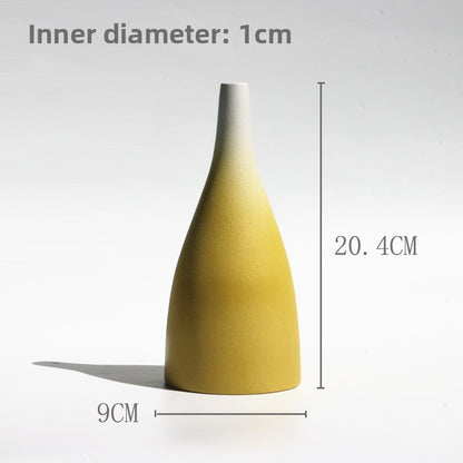 Yellow and white vase with measurements on a white background