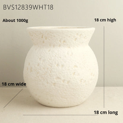 White textured vase with measurements on a neutral background
