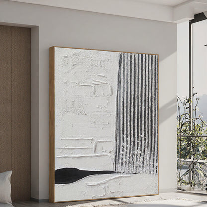Abstract art piece in a modern interior setting with a neutral color palette.