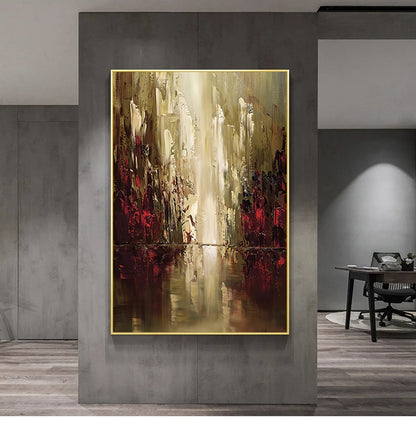 Abstract painting with gold frame on a gray wall