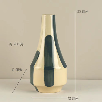 Beige and black vase with measurements on a beige background