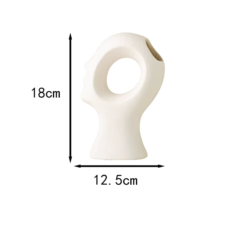White abstract vase with dimensions labeled on a white background