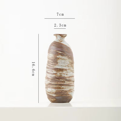 Marbled ceramic vase with dimensions on a white background