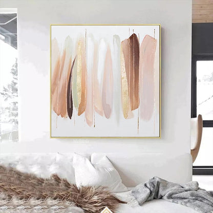 Abstract art painting with brushstroke design in a gold frame on a wall above a bed.