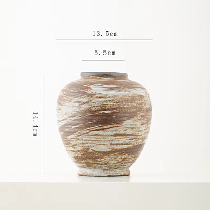 Ceramic vase with dimensions on a white background