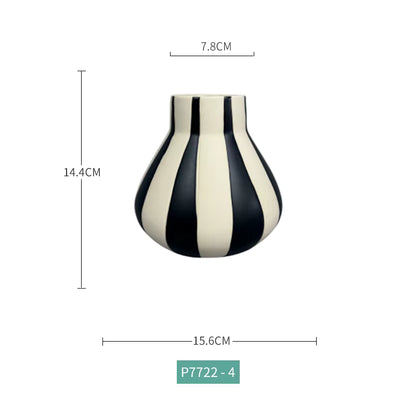 Black and white striped vase with dimensions on a white background