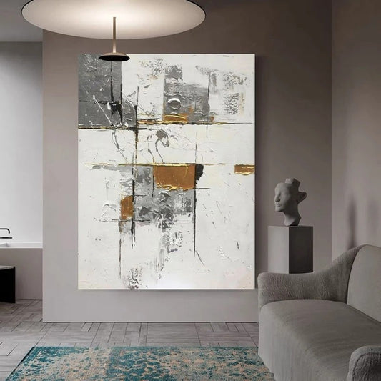 Abstract art piece on a wall in a modern living room