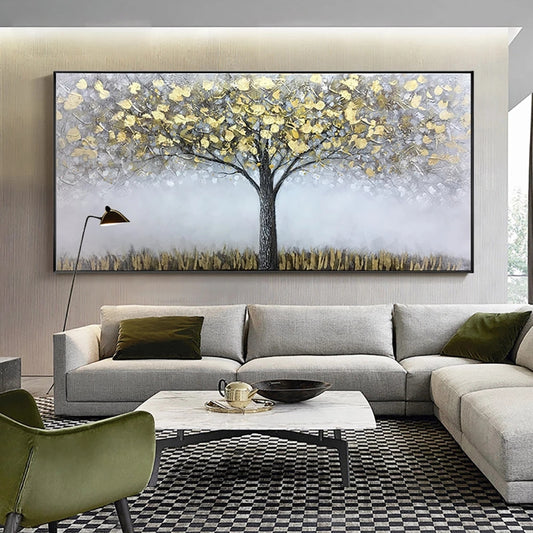 Living room with a large abstract painting of a tree on the wall, a gray sectional sofa, and a green armchair.