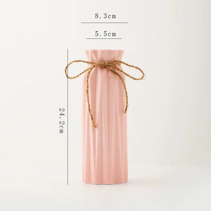 Pink wine bottle gift bag with measurements on a white background