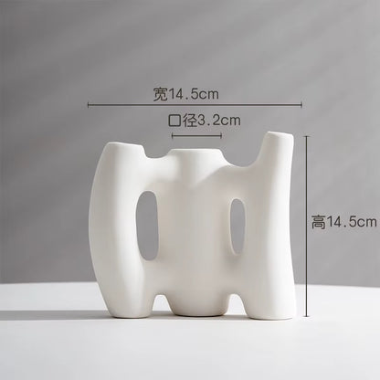 White abstract vase with dimensions on a gray background