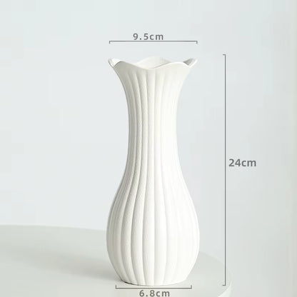 White vase with dimensions labeled on a white background