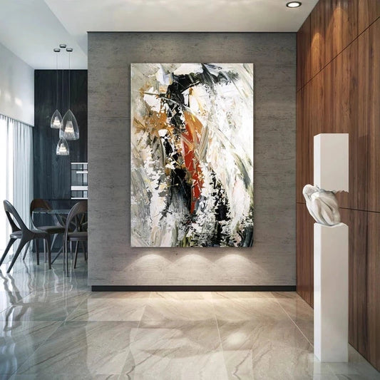 Abstract painting in a modern interior setting with wooden paneling and a dining area.