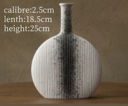 Textured vase on a wooden surface with measurements displayed