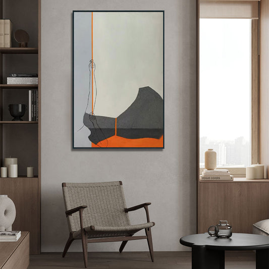 Modern interior with a framed abstract painting on the wall, a chair, and a table.