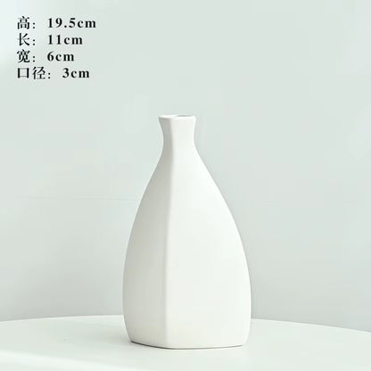White ceramic vase on a light gray background with dimensions displayed.
