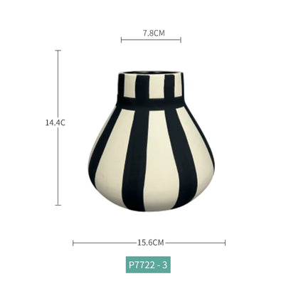 Black and white striped vase with dimensions on a white background