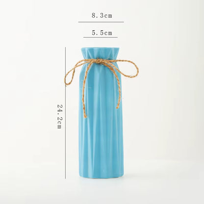 Blue bottle-shaped pouch with twine measurement details on a white background