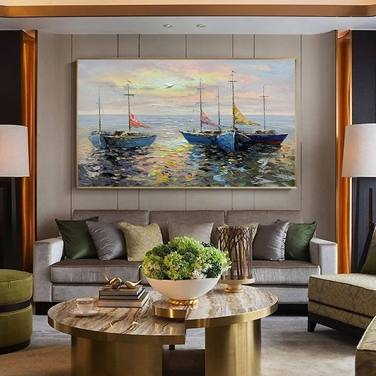 Living room with a painting of boats on the wall above a sofa.