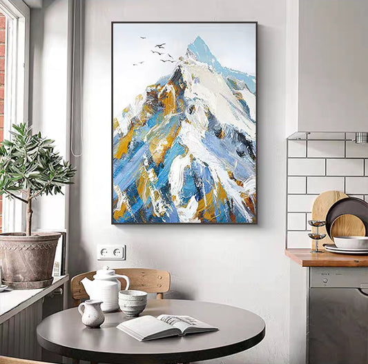 Abstract mountain painting in a modern kitchen setting