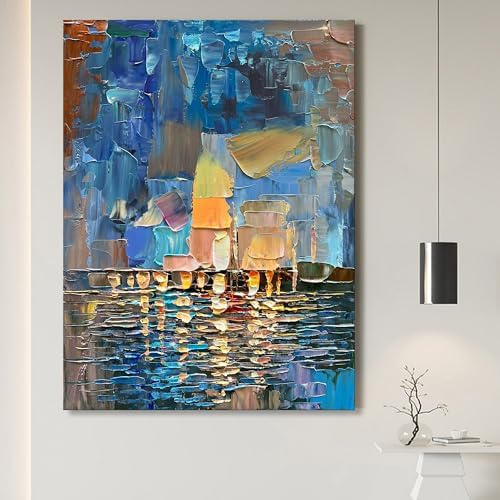 Abstract painting with blue, yellow, and brown tones on a white wall.