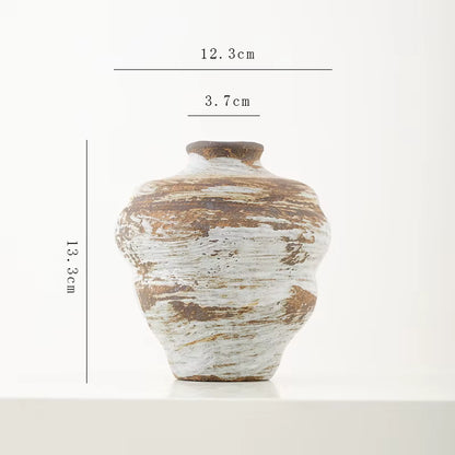 Ceramic vase with dimensions on a white background