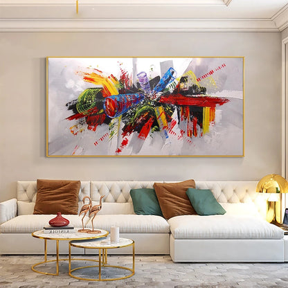 Modern living room with a colorful abstract painting above a white sofa.