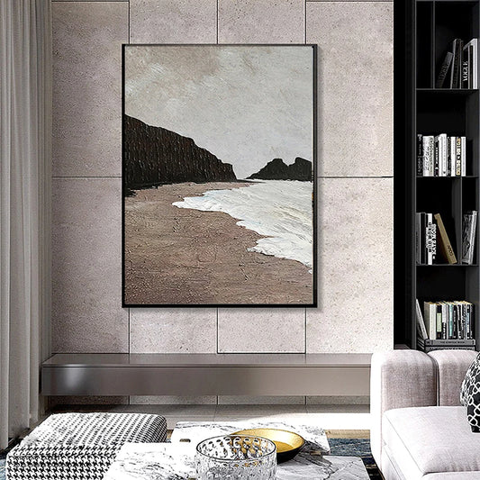 Beach scene painting on a wall in a living room setting