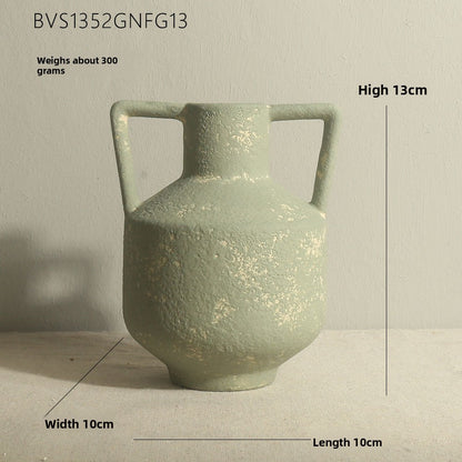 Green ceramic vase with dimensions and weight information on a neutral background