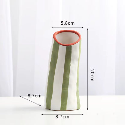 Cylindrical vase with green and white stripes and red top, shown with measurements on a white background.