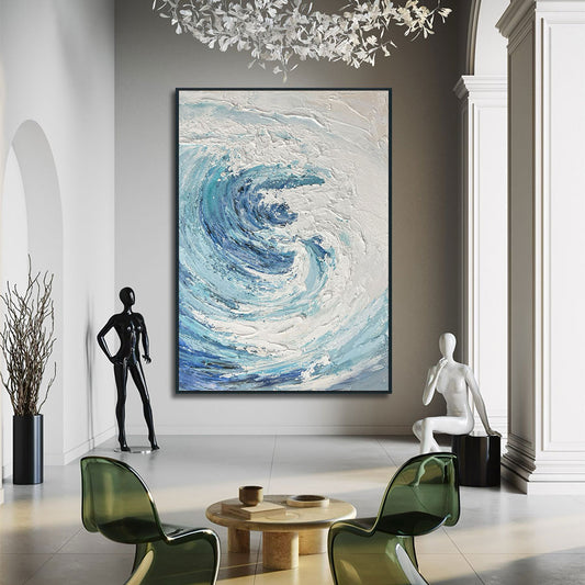 Modern interior with abstract blue and white painting on a wall, mannequins, and decor items.