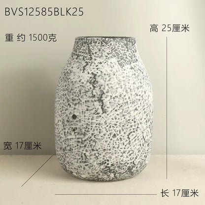 Decorative vase with textured surface on a plain background