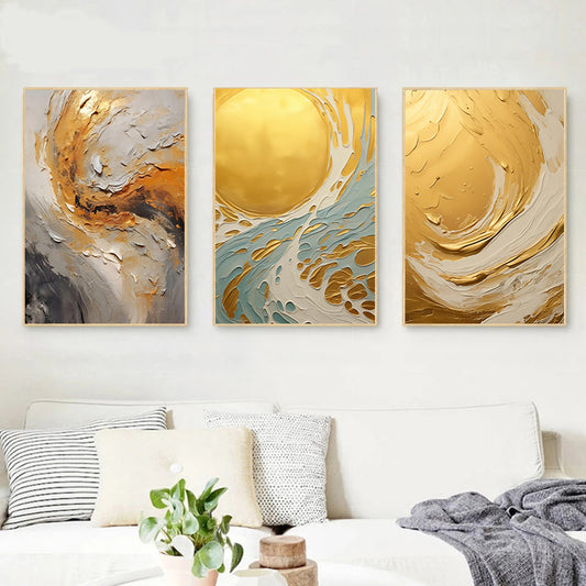 Three abstract art pieces in gold, gray, and white on a wall above a bed.