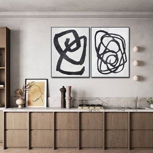 Modern kitchen with abstract art on the wall