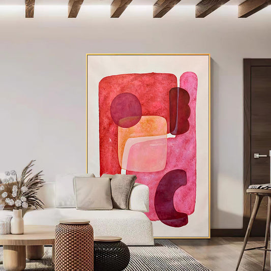 Abstract pink artwork in a modern living room setting