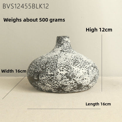 Textured vase with measurements on a neutral background