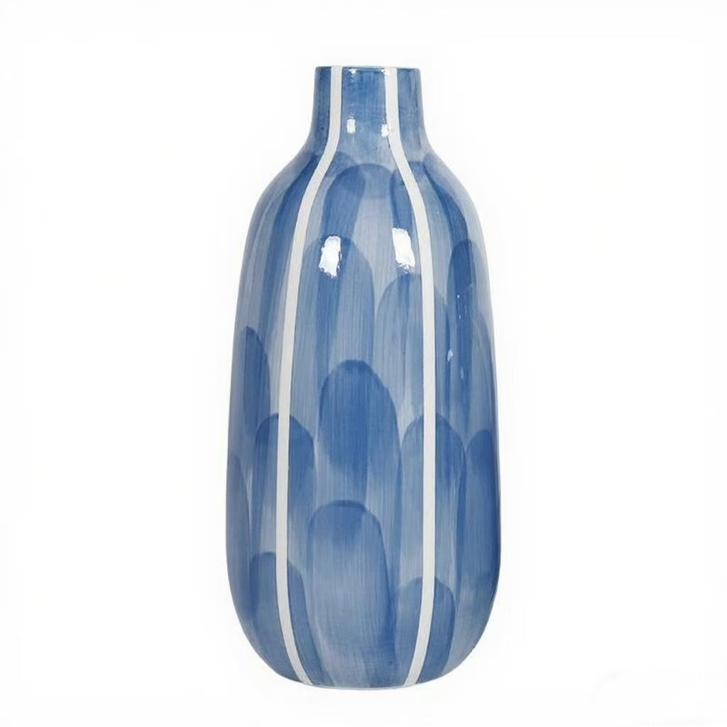 Blue and white patterned vase on a white background