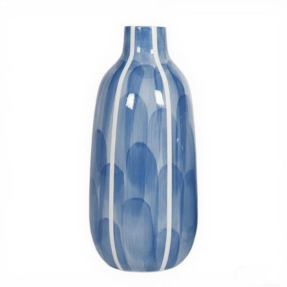 Blue and white patterned vase on a white background
