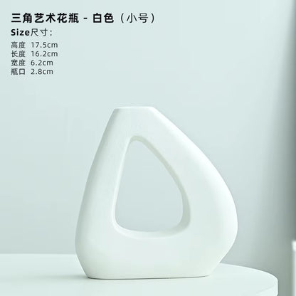 White ceramic vase on a light gray background with product dimensions displayed.