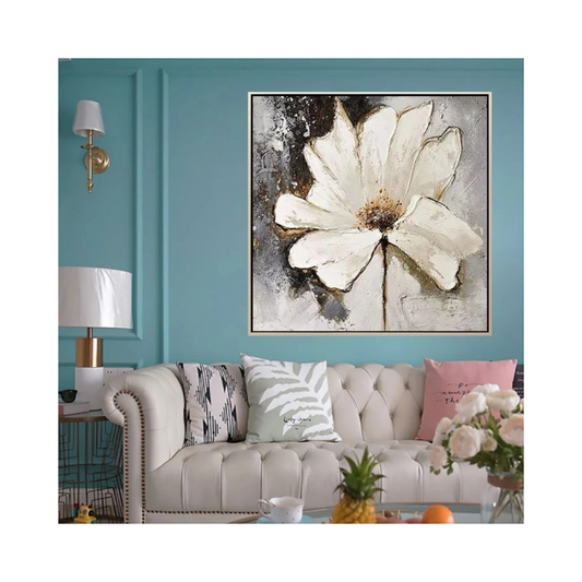 Living room with a large abstract flower painting on the wall, gray sofa with decorative pillows, and a teal wall.