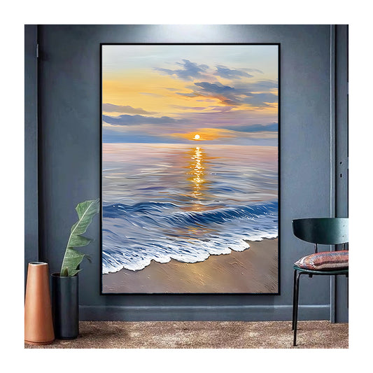 Framed artwork of a sunset over water on a wall with decorative elements.
