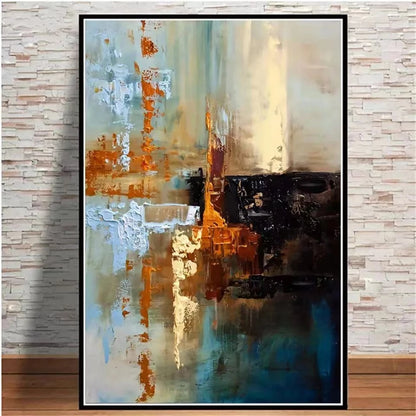 Abstract painting with brown, blue, and black tones on a textured wall.