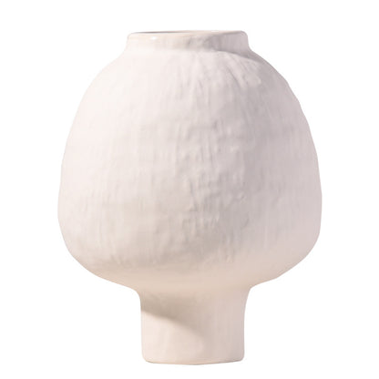 White ceramic vase on a white background